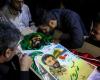 |تصاویر| وداع تلخ خانواده با شهید مدافع حرم ‎